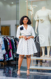 Elegant white polka dot skater dress